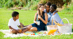 Couple with children at picnic
